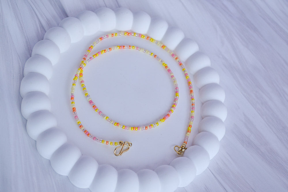 Perlenkette in Pink, Gelb, Rosa und Orange