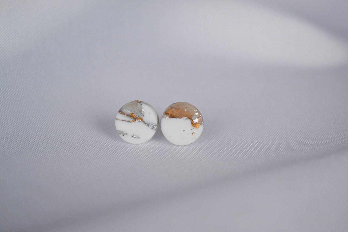 Sol stud earrings in white & metallic
