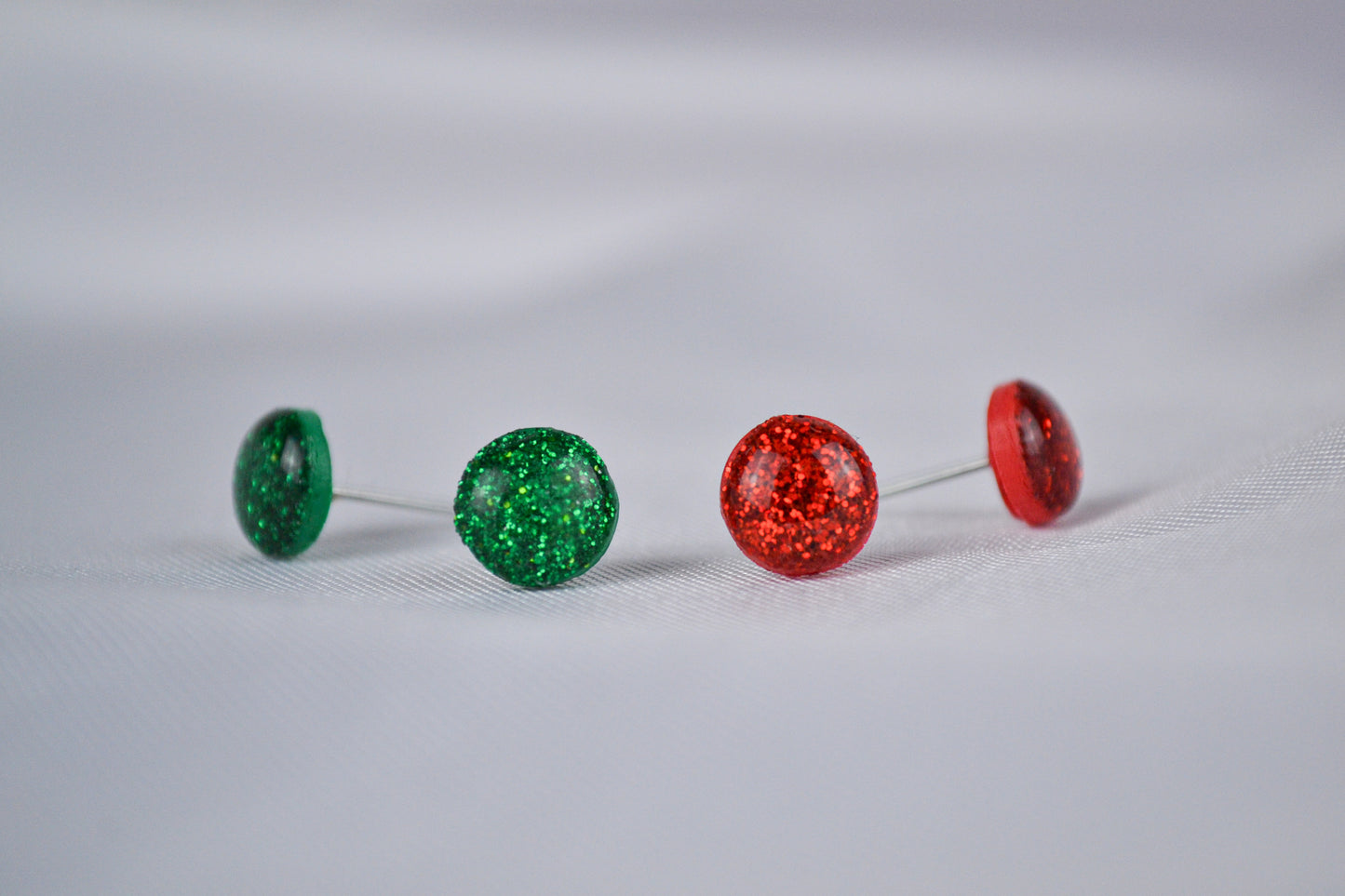Glitter plug set in red and green