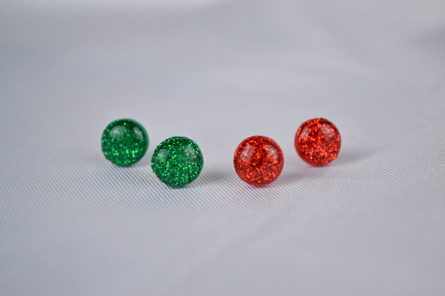 Glitter plug set in red and green
