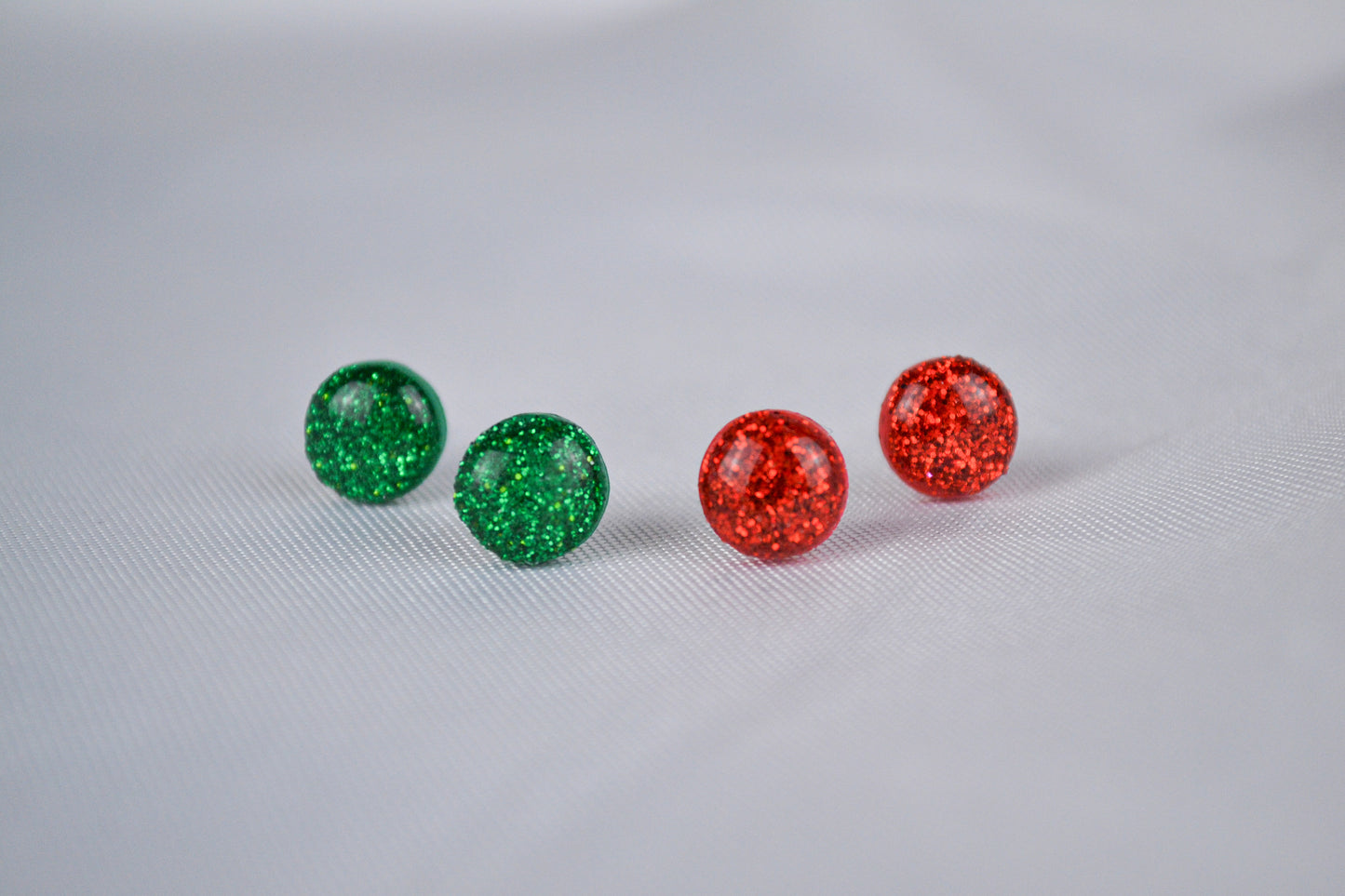 Glitter plug set in red and green