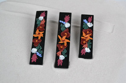 Hair clip in black with autumn flowers