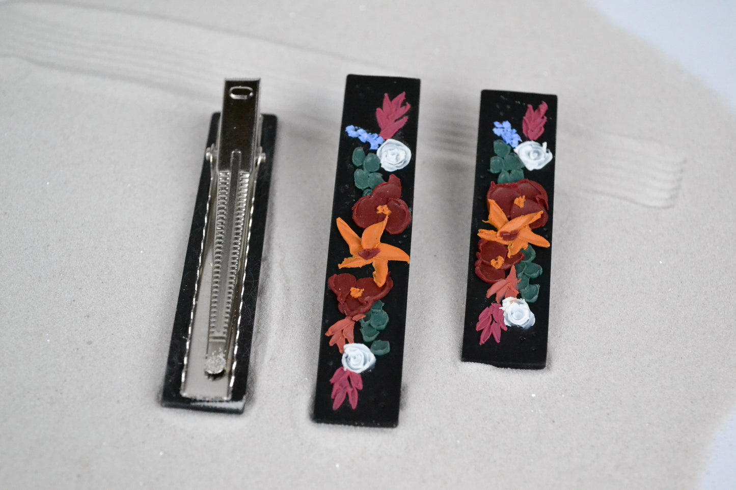 Hair clip in black with autumn flowers